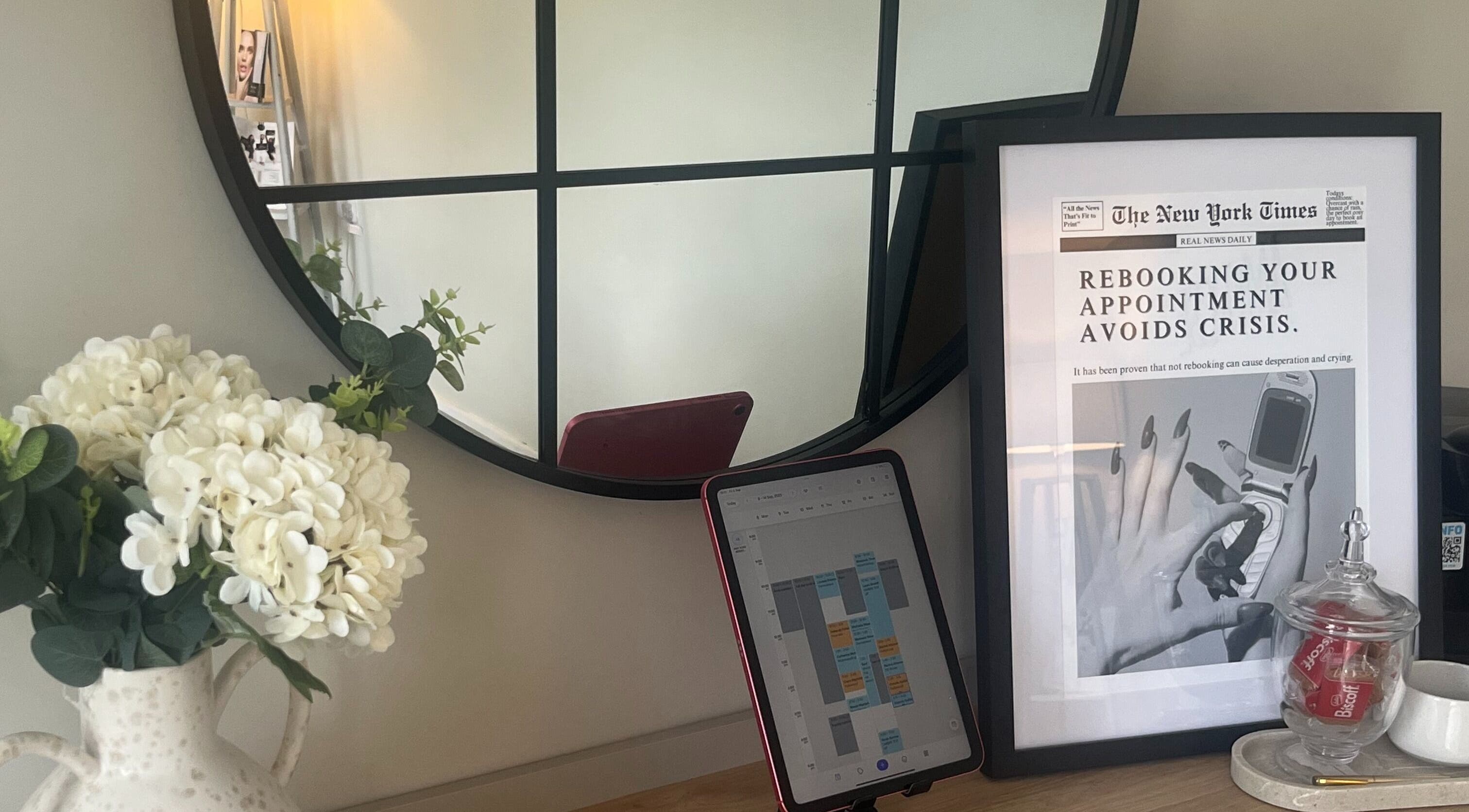 Stylish mirror and schedule display at By Amy Rose in Gainsborough, England, GB.