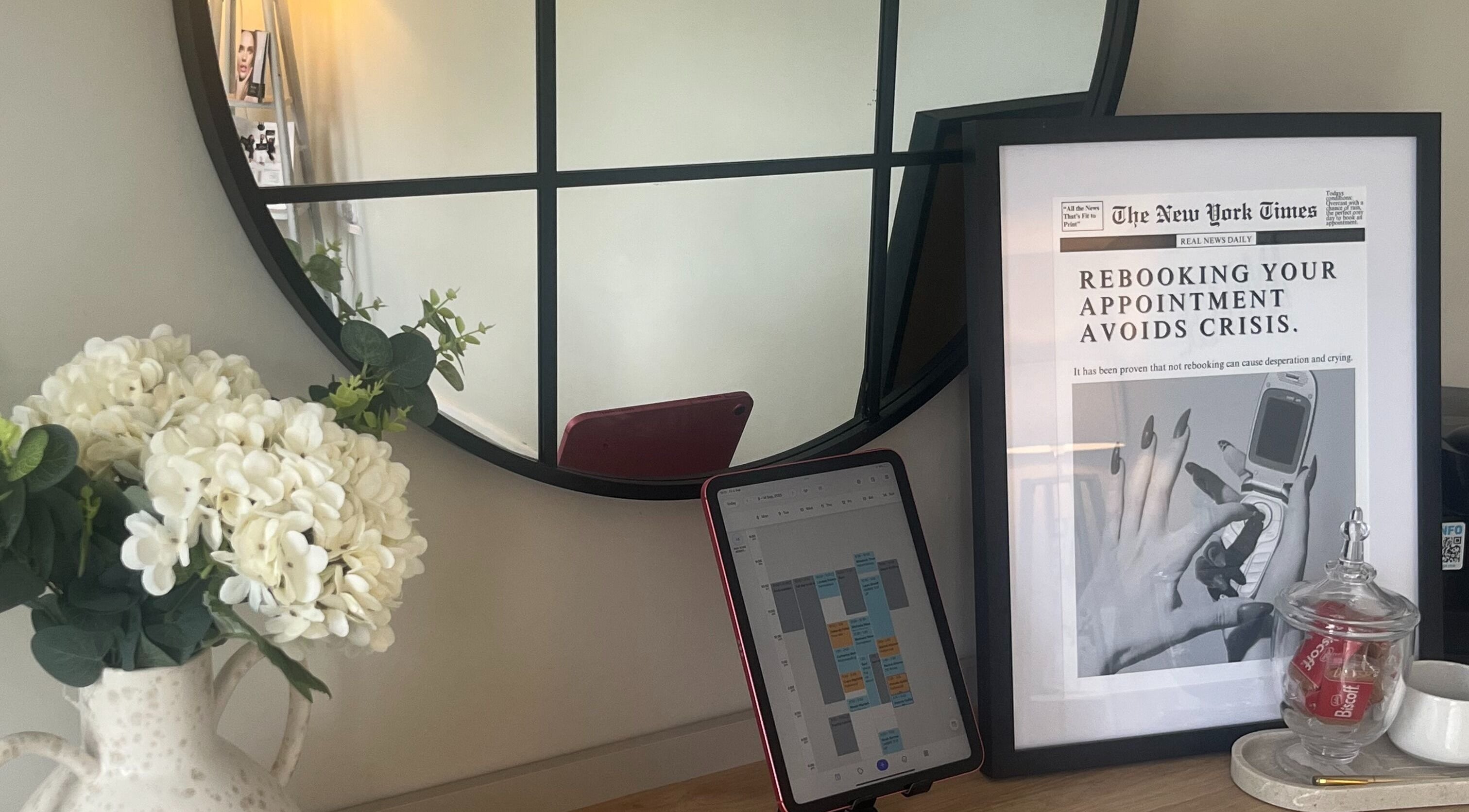 Stylish mirror and schedule display at By Amy Rose in Gainsborough, England, GB.