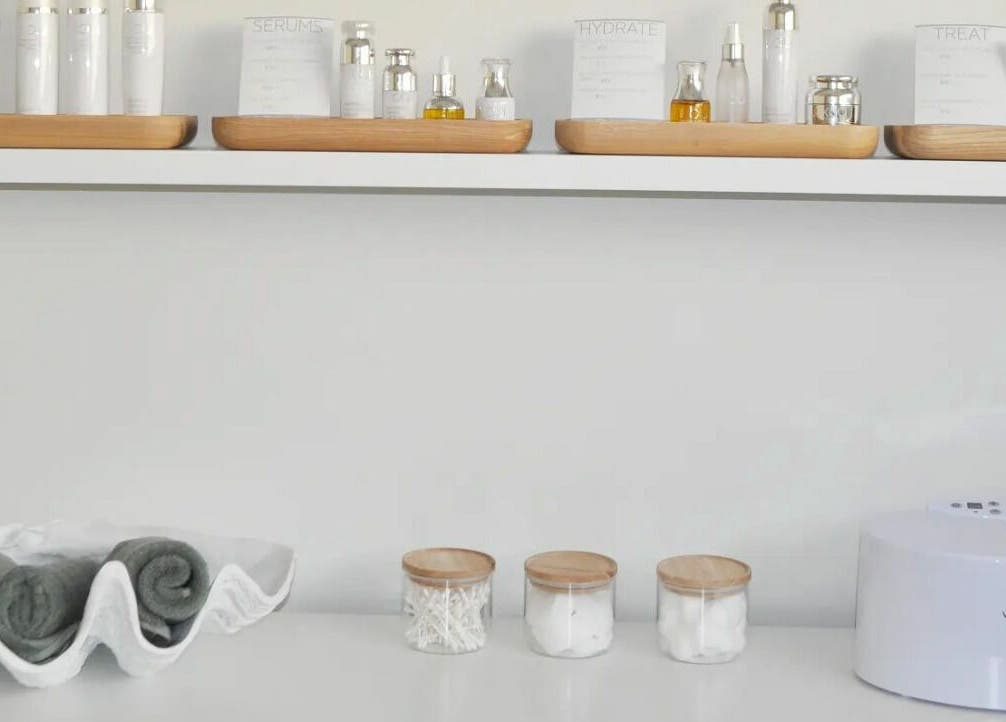 The Beauty Room Florida Beach in Dawesville, Western Australia: elegant skincare display with cozy towels and jars.