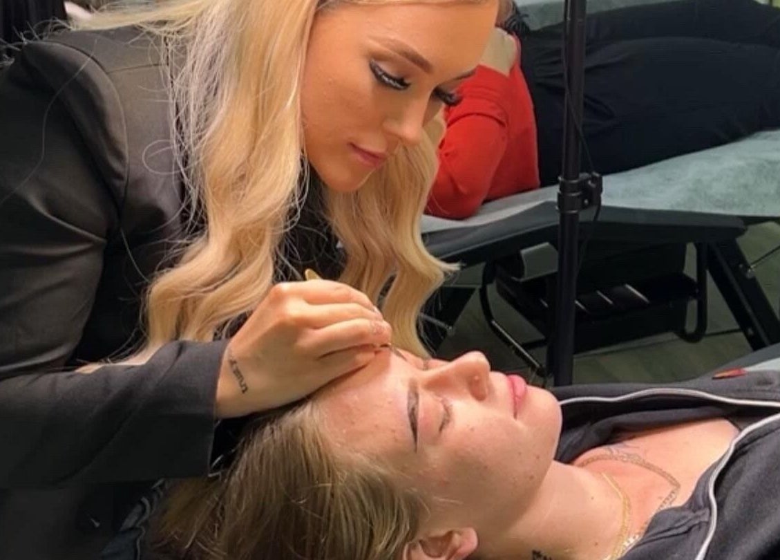 Brow artist at Perfectly Arched in Byford, Western Australia, AU performing precise eyebrow styling.