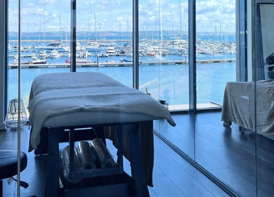 Relaxing spa room with harbor view at The Beauty Deck, Portland, England, GB.