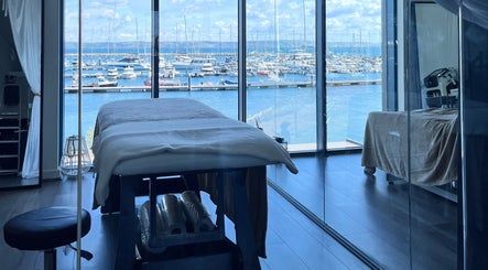 Relaxing spa room with harbor view at The Beauty Deck, Portland, England, GB.