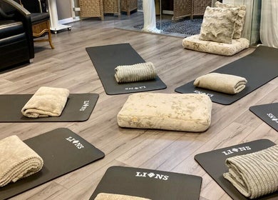 Yoga mats and cushions at The Beauty Deck, Portland, England, GB, set for a relaxation session.