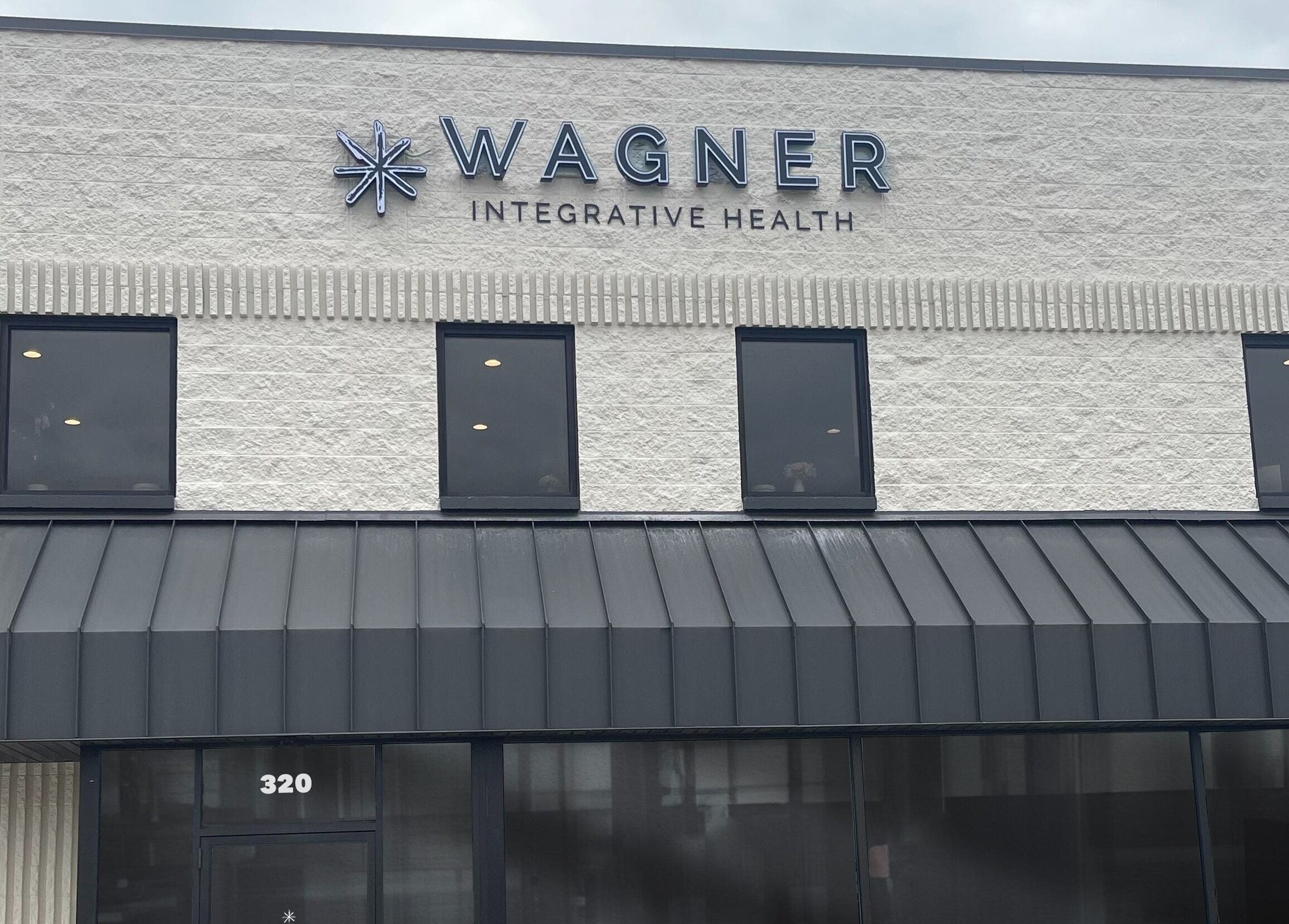 Exterior of Wagner Aesthetic Studio in De Pere, Wisconsin, US showcasing modern architecture.
