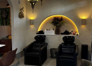 Elegant salon chairs at Sass & Soul Hair Studio in Maroochydore, Queensland, AU, exuding a calming ambiance.