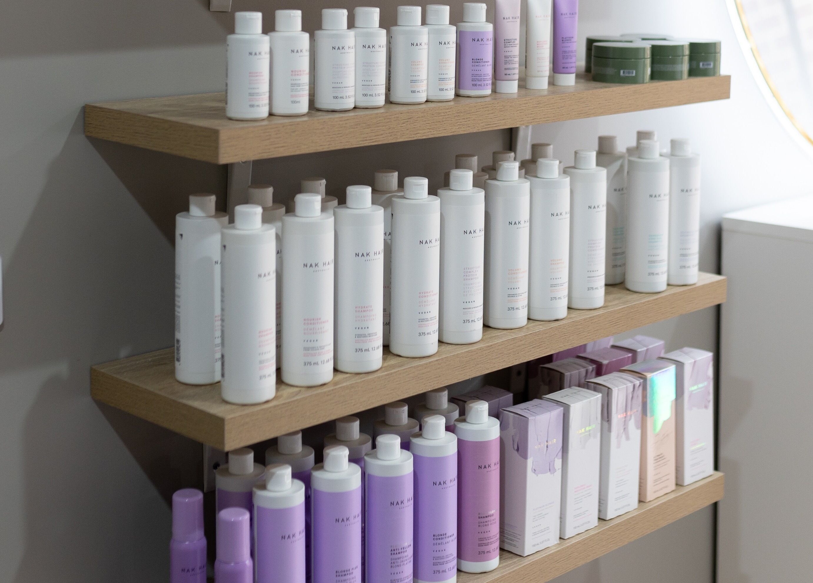 Shelves of premium haircare products at Hair By Alicia Louise, Warragul, Victoria, AU.