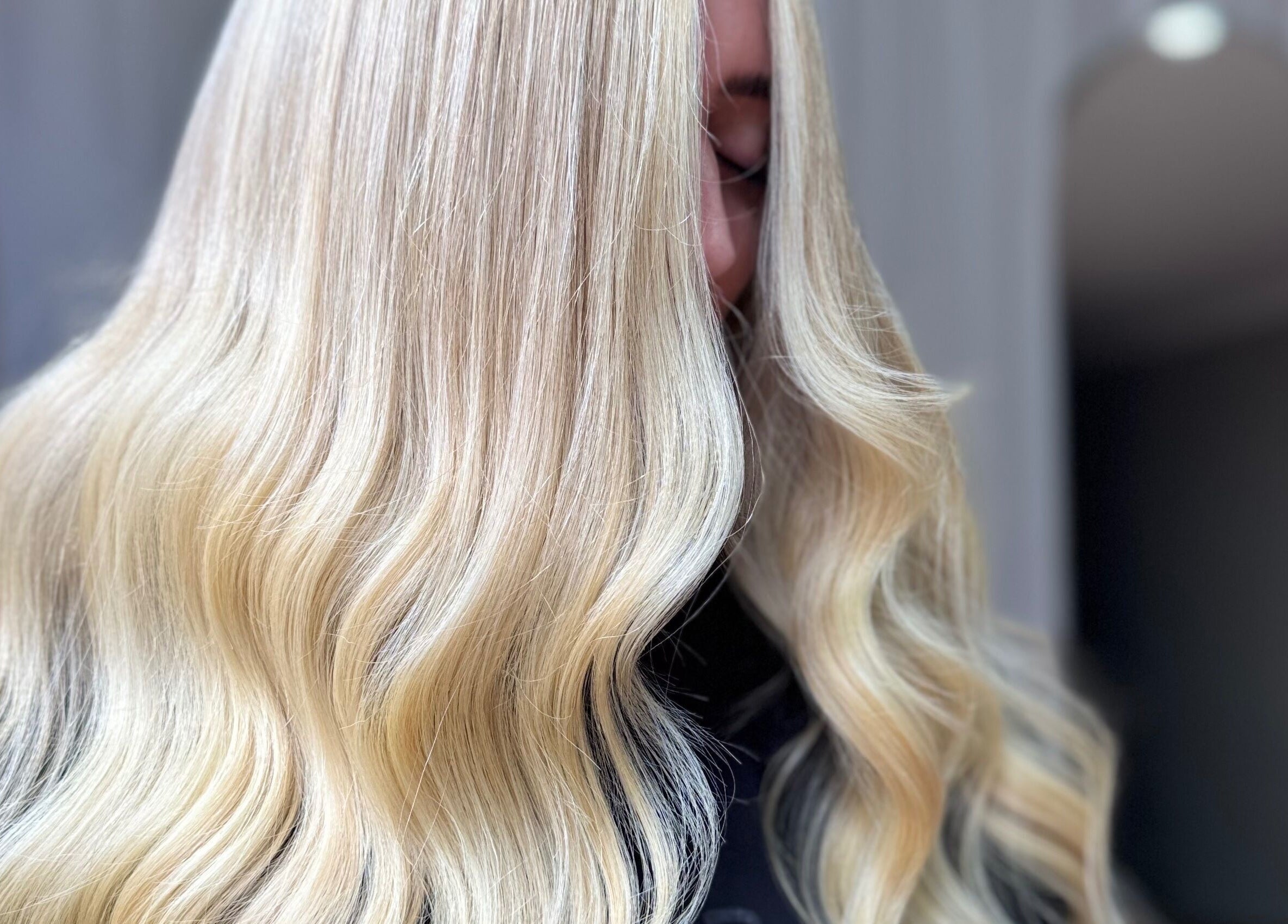 Blonde wavy hair styled at Hair By Alicia Louise, Warragul, Victoria, AU salon for a luxurious look.