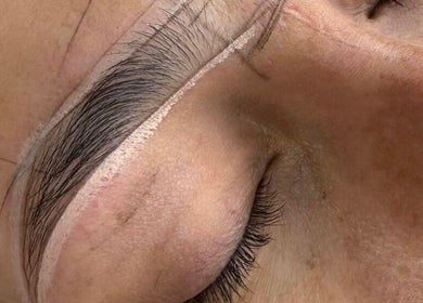 Close-up of eyebrow styling at Maria Ramos, London, England, GB, showcasing precision in beauty treatment.