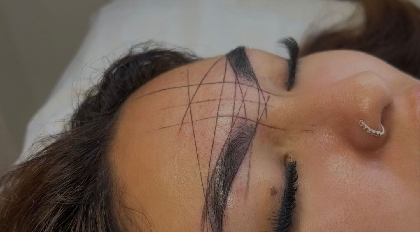 Detailed brow mapping at Maria Ramos in London, England, GB enhancing eyebrow symmetry and design.