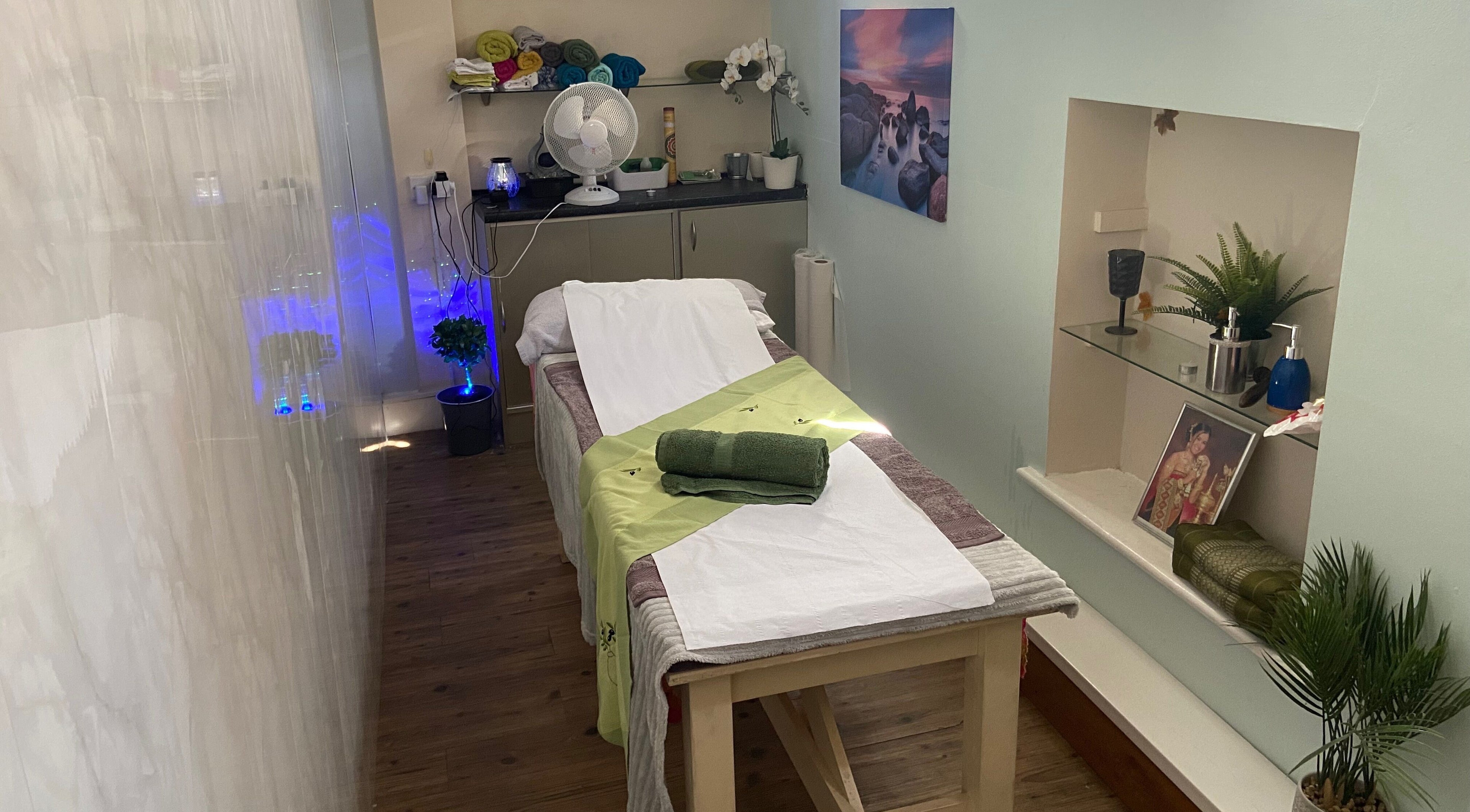 Relaxing therapy room at Green Thai Massage Therapy, Derby, England, GB. Cozy table with soothing decor.