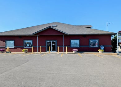 Front view of Derma Defined Esthetics in High River, Alberta, CA with a stylish exterior and clear signage.