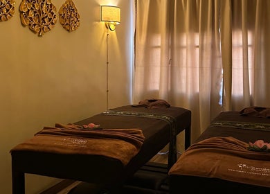 Peaceful massage room at Thai London Therapy Marrakesh, Marrakech, Marrakech-safi, MA with two massage tables.