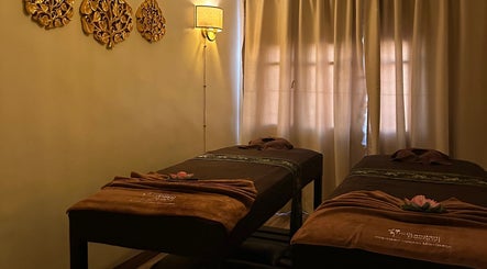 Peaceful massage room at Thai London Therapy Marrakesh, Marrakech, Marrakech-safi, MA with two massage tables.