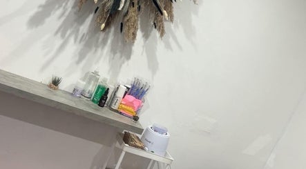 Chic beauty station at Lani’s Lashes, Sheffield, England, GB, showcasing tools and decor in a serene setting.