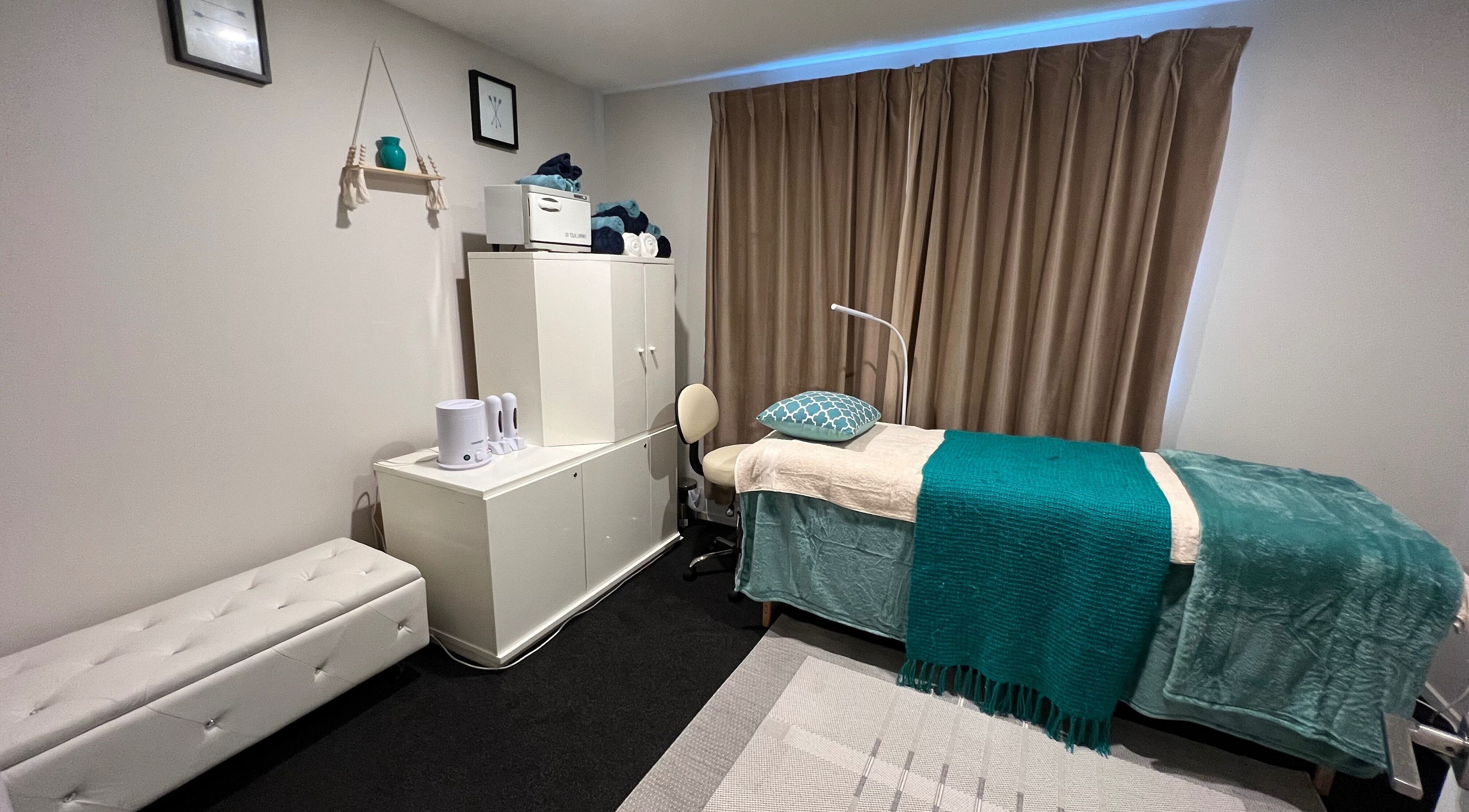 Relaxing treatment room at Classy Lash And Beauty Studio, Christchurch, Canterbury, NZ, with cozy decor.