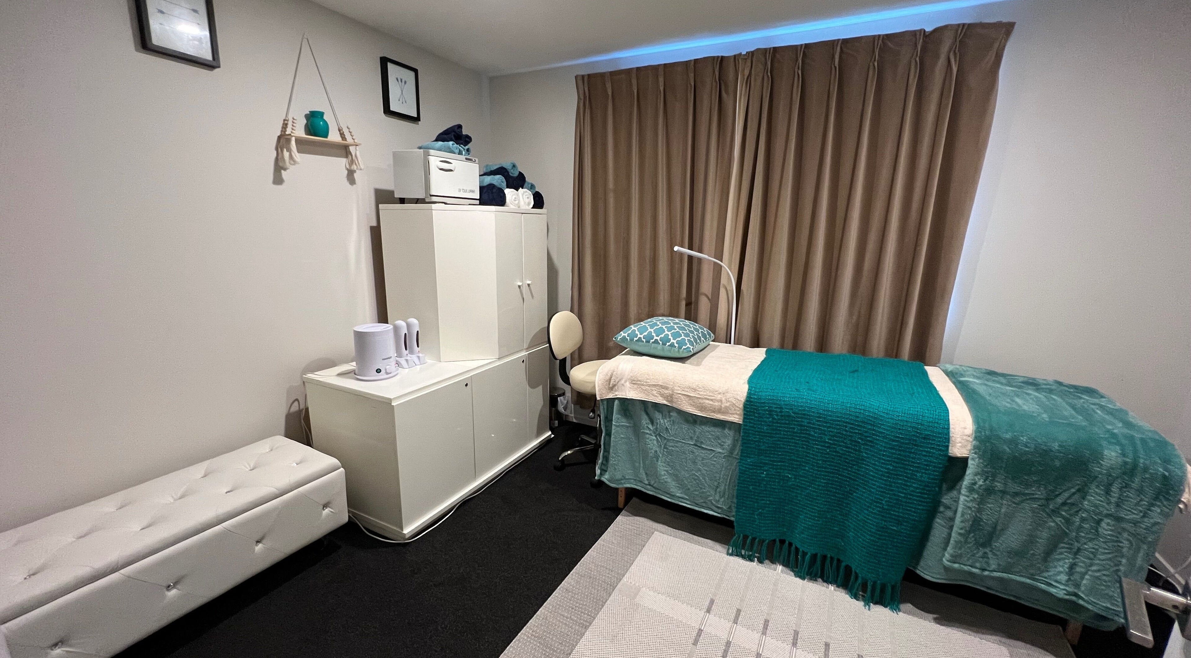 Relaxing treatment room at Classy Lash And Beauty Studio, Christchurch, Canterbury, NZ, with cozy decor.