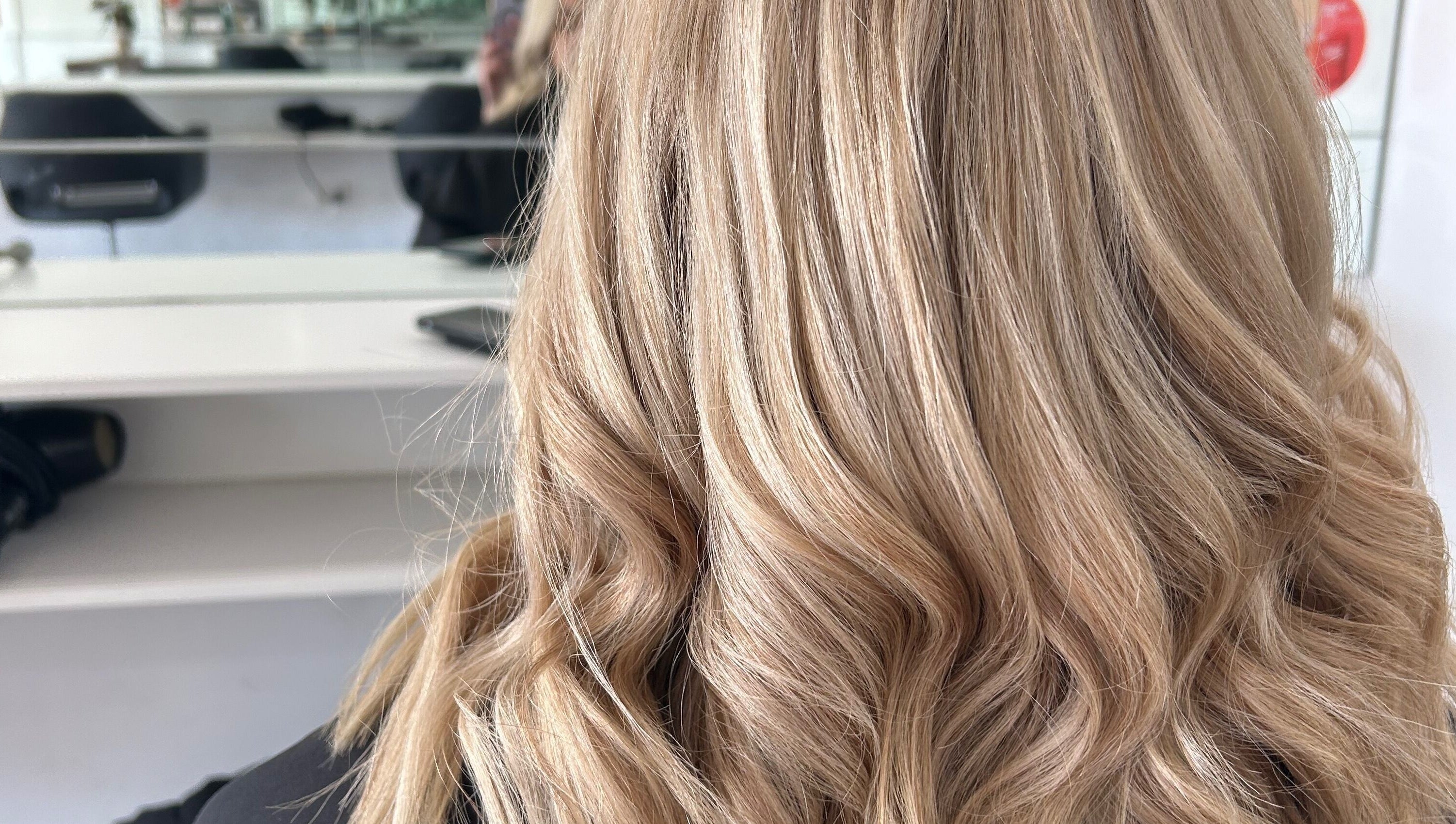 Styled blonde waves at Styled by Jess Toohey, Marks Point, New South Wales, AU.