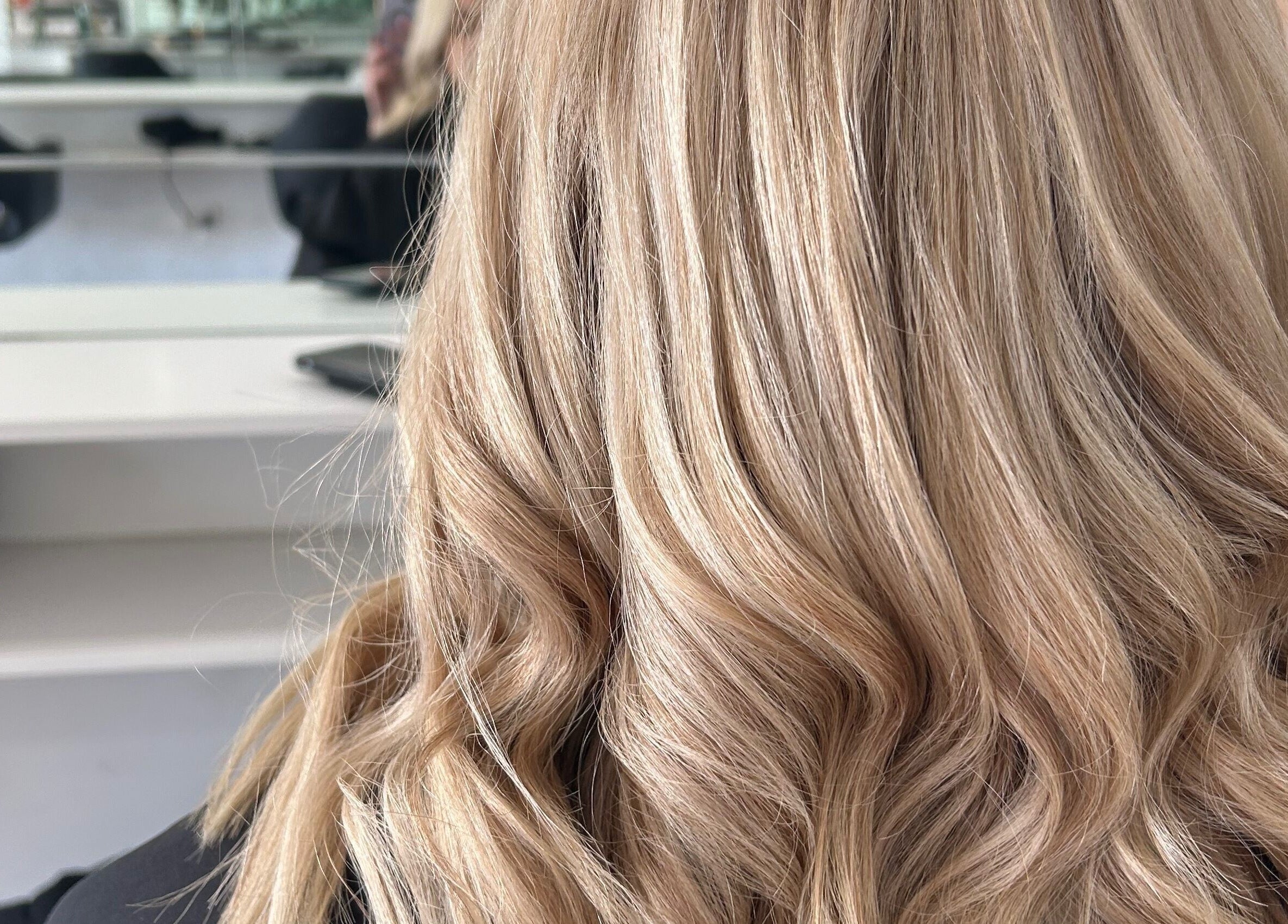 Styled blonde waves at Styled by Jess Toohey, Marks Point, New South Wales, AU.