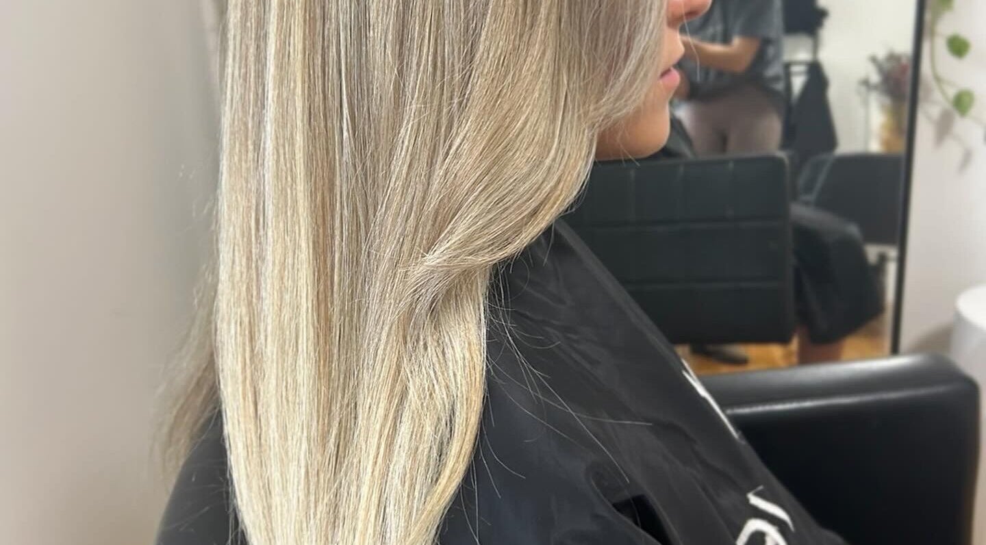 Sleek, beautifully styled blonde hair by Styled by Jess Toohey in Marks Point, New South Wales, AU.