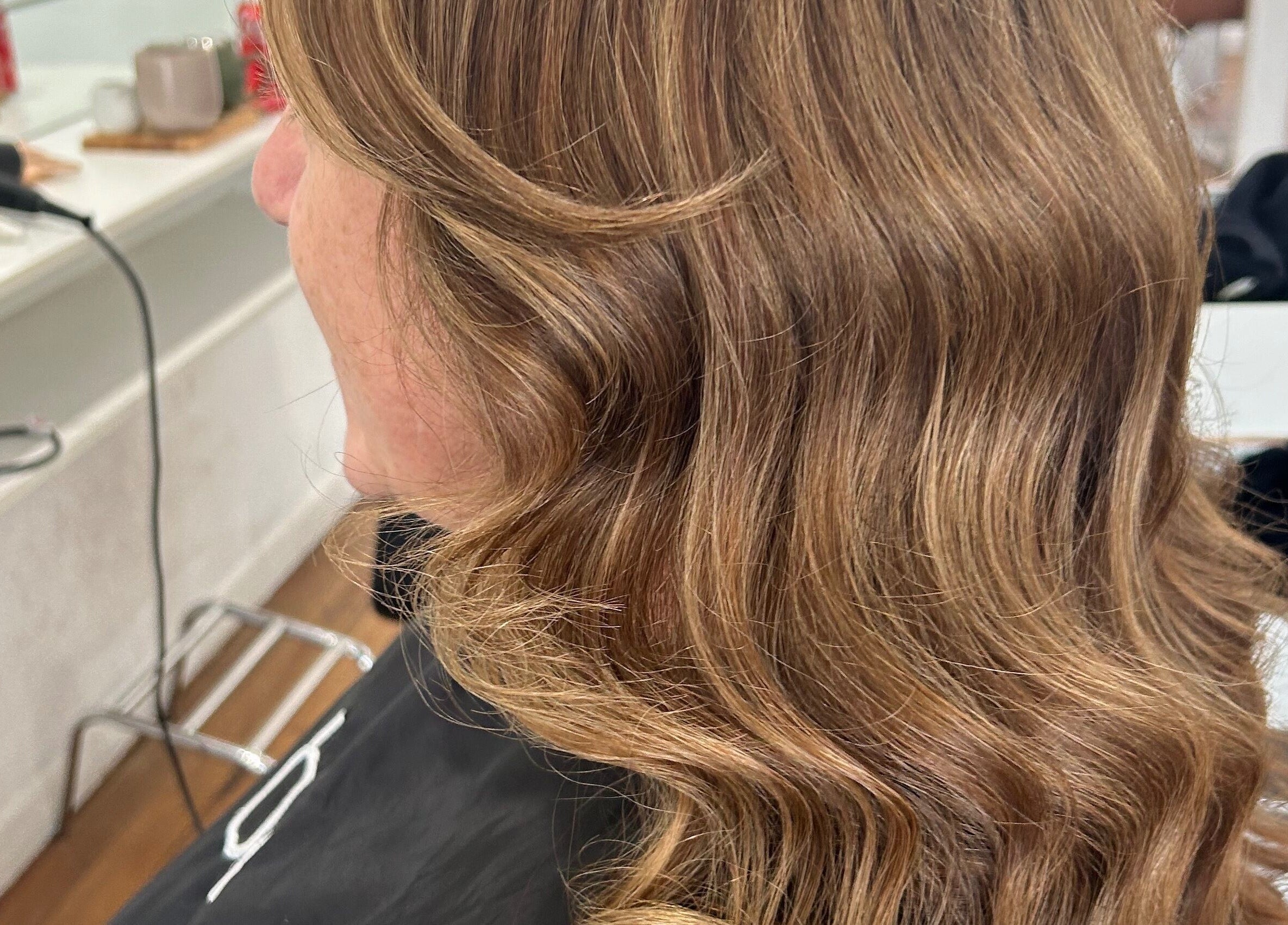 Beautifully styled wavy hair at Styled by Jess Toohey, Marks Point, New South Wales, AU.