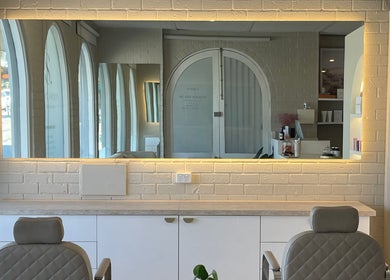 Elegant styling area at Ellie Schon Makeup Artist in Melbourne, Victoria, AU, with modern décor and ambient lighting.