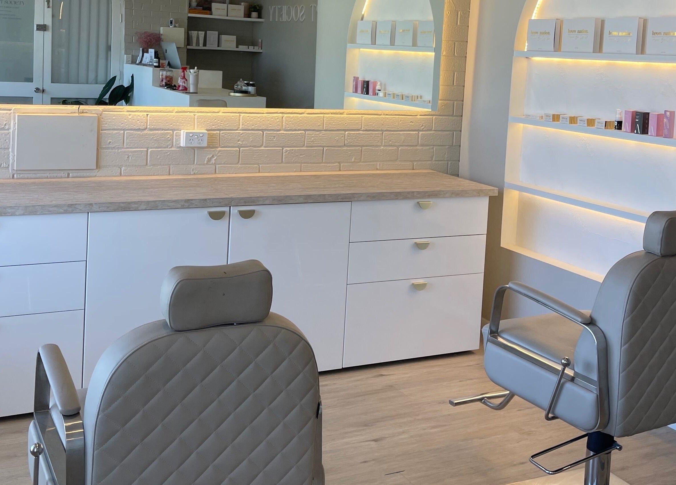 Modern interior of Makeup By Courtney Jade / Coco Brows in Melbourne, Victoria, AU, featuring stylish salon chairs.