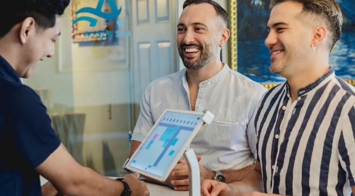 Guests warmly welcomed at Acqua Spa for Men, Puerto Vallarta, Jalisco, MX, reception.