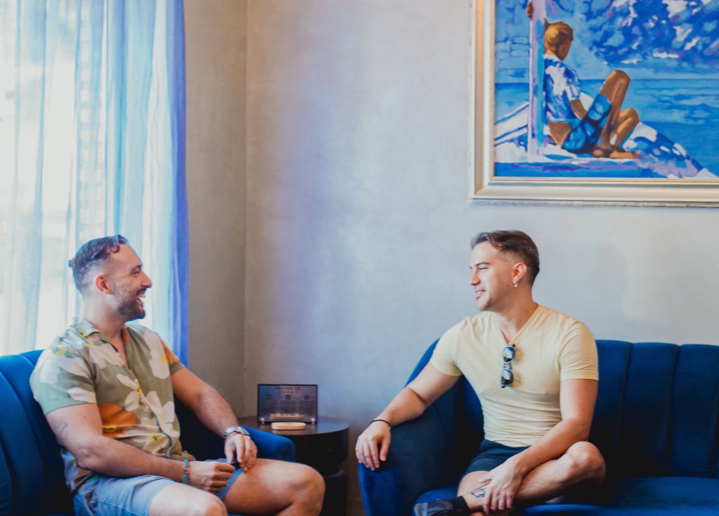 Two men chatting in lounge at Acqua Spa for Men, Puerto Vallarta, Jalisco, MX.