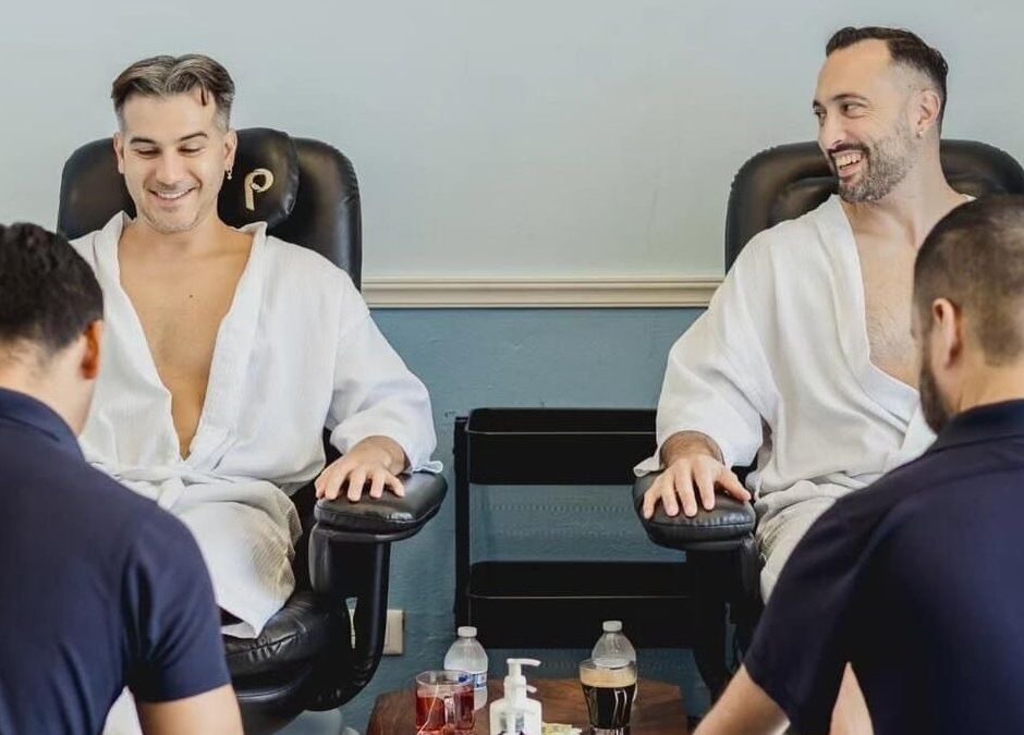 Men enjoying pedicures at Acqua Spa for Men, Puerto Vallarta, Jalisco, MX, showcasing ultimate relaxation.