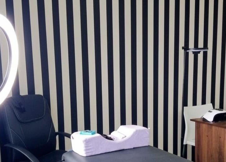 Modern beauty station at GRWM Beauty Bar & Academy in Gqeberha, Eastern Cape, ZA with a chic black and white decor.