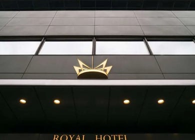 Elegant facade of Radisson Collection Royal Hotel, Copenhagen in København, Denmark, DK with iconic crown logo.