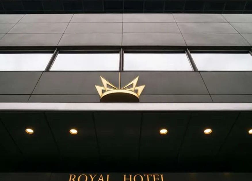 Elegant facade of Radisson Collection Royal Hotel, Copenhagen in København, Denmark, DK with iconic crown logo.