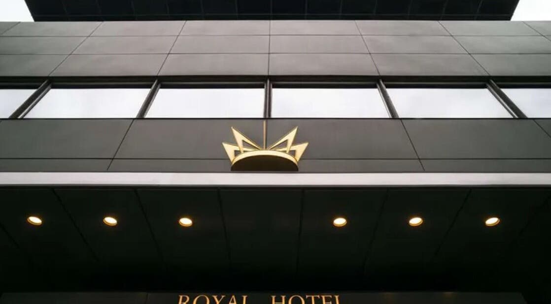 Elegant facade of Radisson Collection Royal Hotel, Copenhagen in København, Denmark, DK with iconic crown logo.