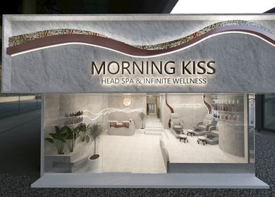 Exterior view of Morning Kiss Blissful Head Spa Nail Salon Manicure Onsen in Bangkok, TH, featuring elegant design.