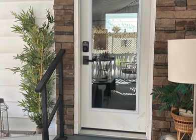 Charming entrance of Hot on Top Salon in Regina, Saskatchewan, CA with cozy seating and greenery.