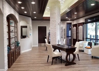 Tranquil interior of Oasis Med Spa in Venice, Florida, US, featuring elegant seating and ambient lighting.