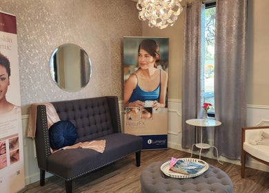 Cozy lounge at Oasis Med Spa, Venice, Florida, US featuring comfortable seating and stylish decor.