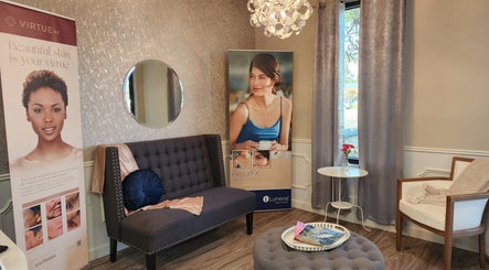 Cozy lounge at Oasis Med Spa, Venice, Florida, US featuring comfortable seating and stylish decor.