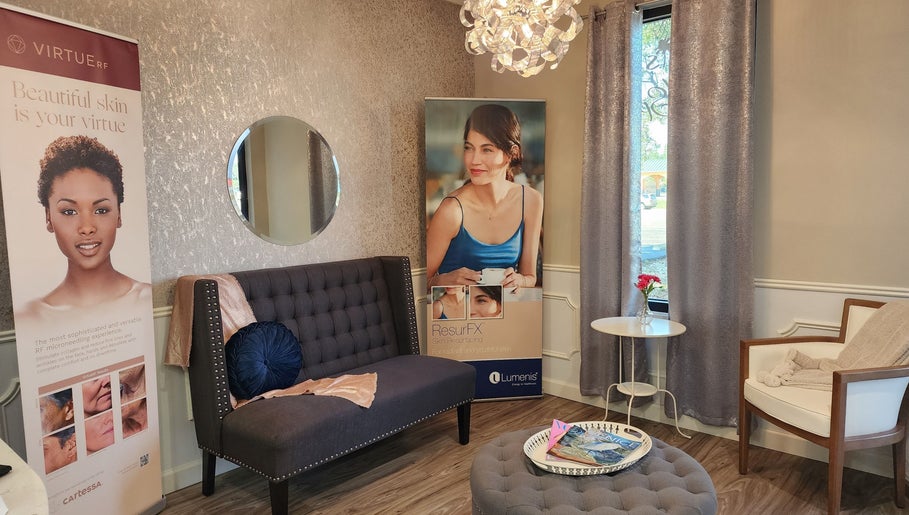 Elegant seating area at Oasis Med Spa, Venice, Florida, US, with plush chairs and tasteful decor.