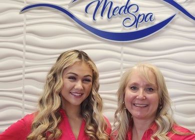 Staff at Oasis Med Spa, Venice, Florida, US, welcoming guests with smiles.