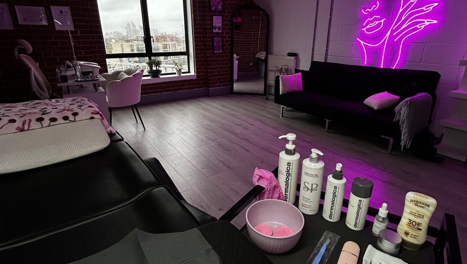 Jrbeautylab spa in London, England, GB, features vibrant decor with a relaxing massage setup.