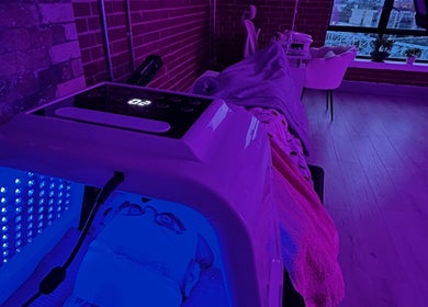 LED therapy session at Jrbeautylab, London, England, GB in a serene, ambient-lit treatment room.