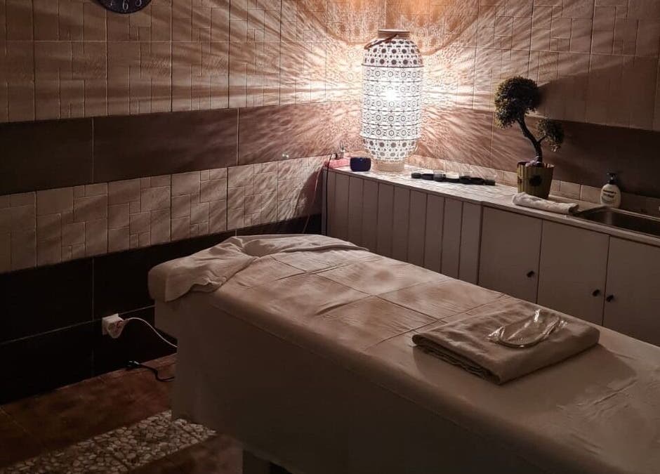 Relaxing treatment room at Premier Spa and Aesthetics, T'bilisi, Tbilisi, GE with ambient lighting.