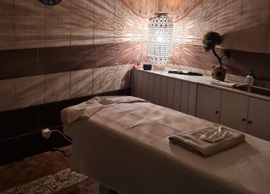 Relaxing treatment room at Premier Spa and Aesthetics, T'bilisi, Tbilisi, GE with ambient lighting.