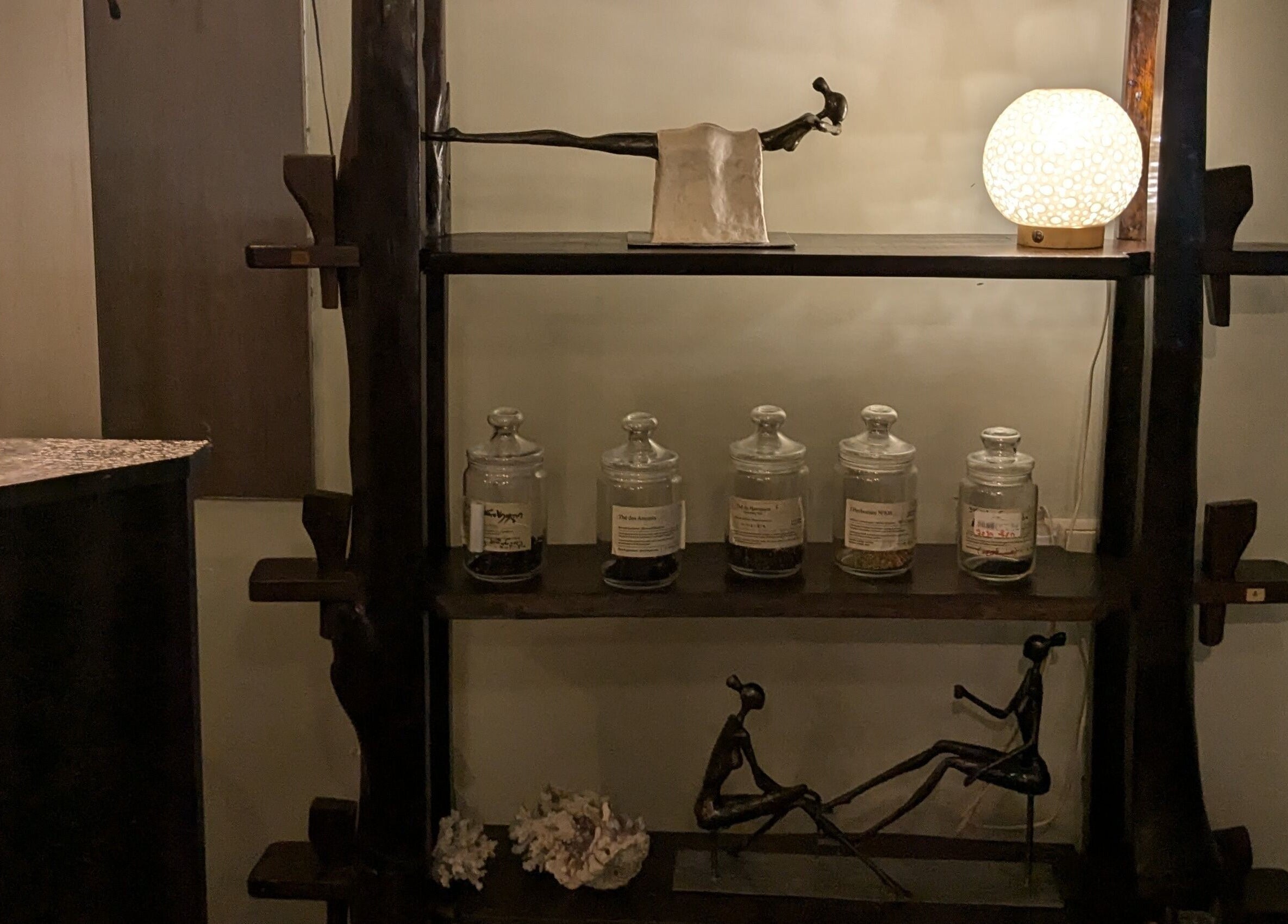 Elegant shelf in Premier Spa and Aesthetics, T'bilisi, Tbilisi, GE with unique decor and ambient lighting.