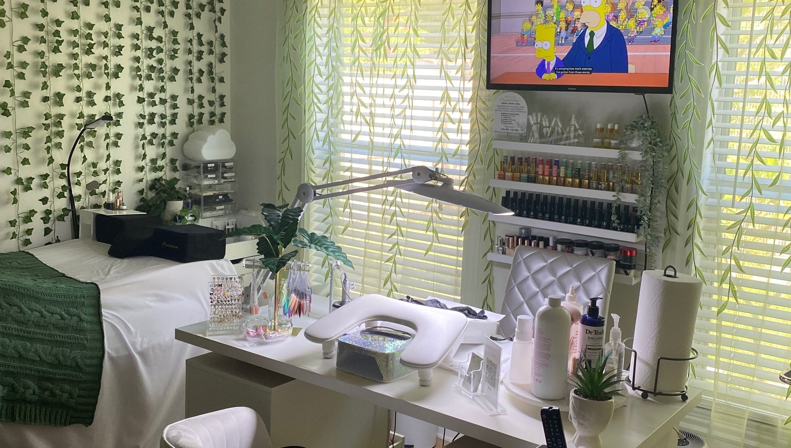 Relaxing beauty workspace at Polishedbycass, Ocoee, Florida, US, with greenery and organized nail products.