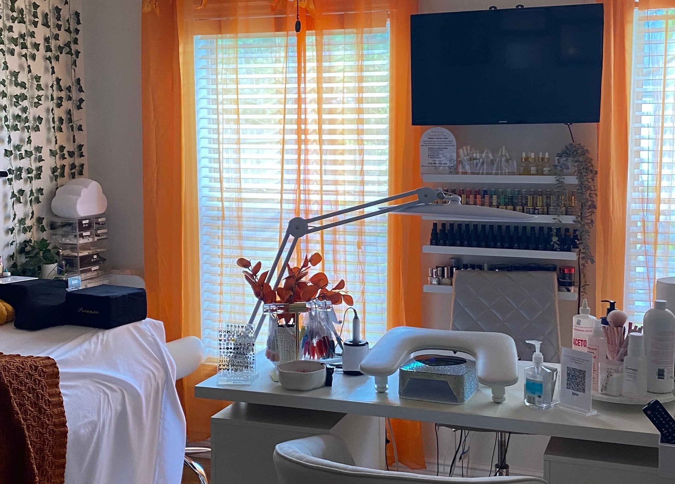 Polishedbycass nail station with chic decor and tools in Ocoee, Florida, US.