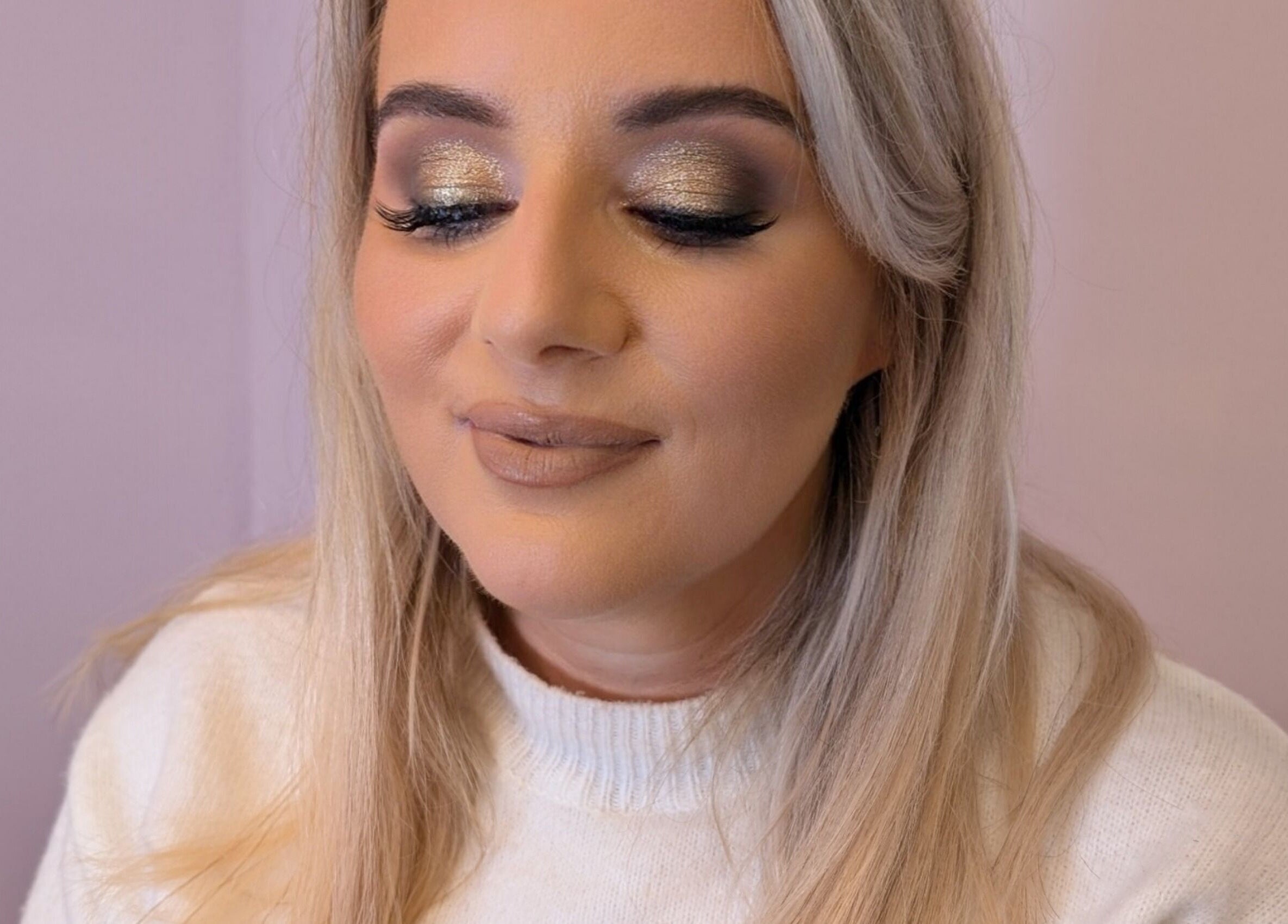 Radiant makeup artistry at Lisa Naughton Mua in Athleague, County Roscommon, IE, with shimmering gold eyeshadow.