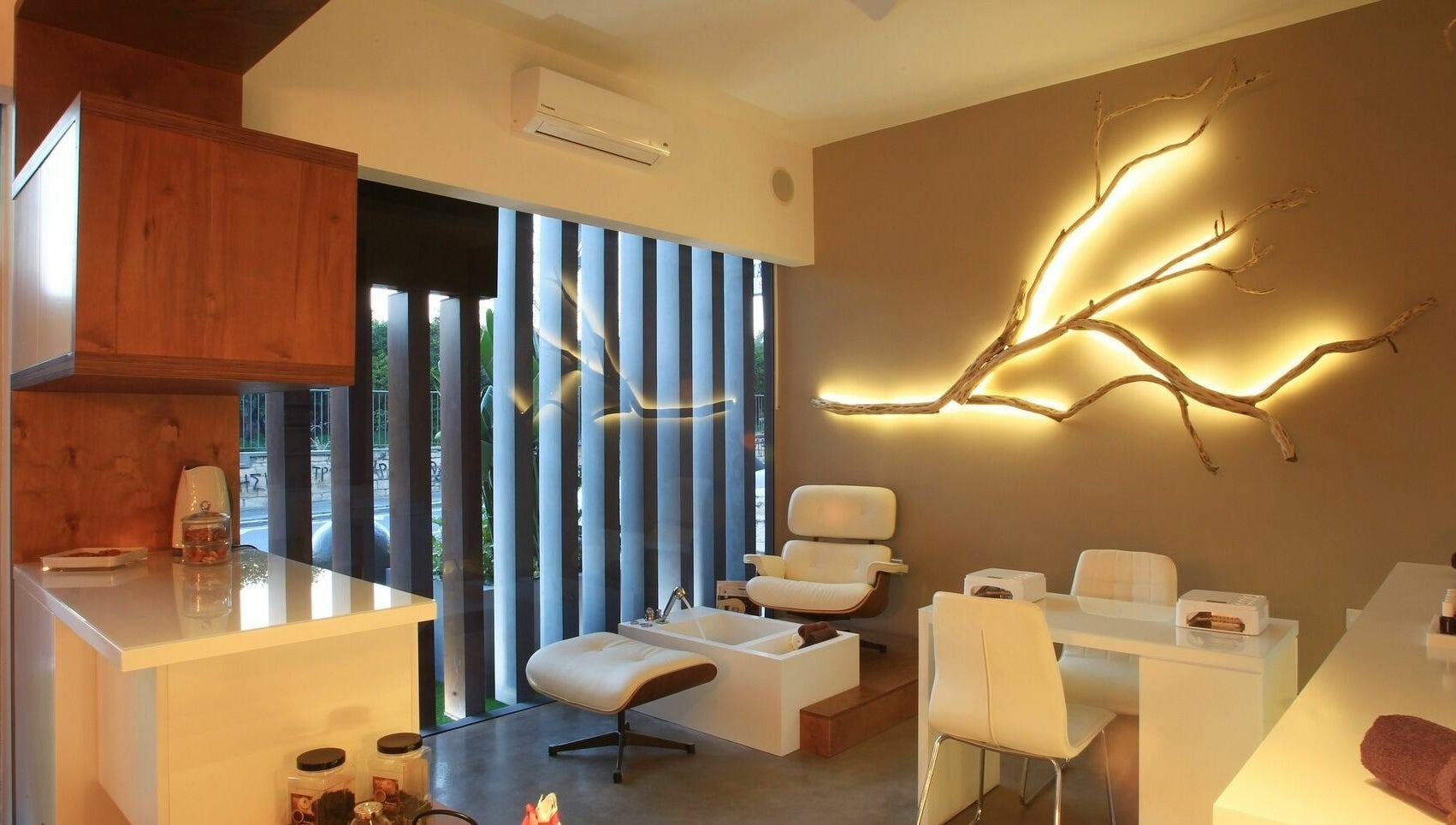 Relaxation area at Suenso Spa, Limassol, Limassol, CY, featuring elegant seating and ambient lighting.