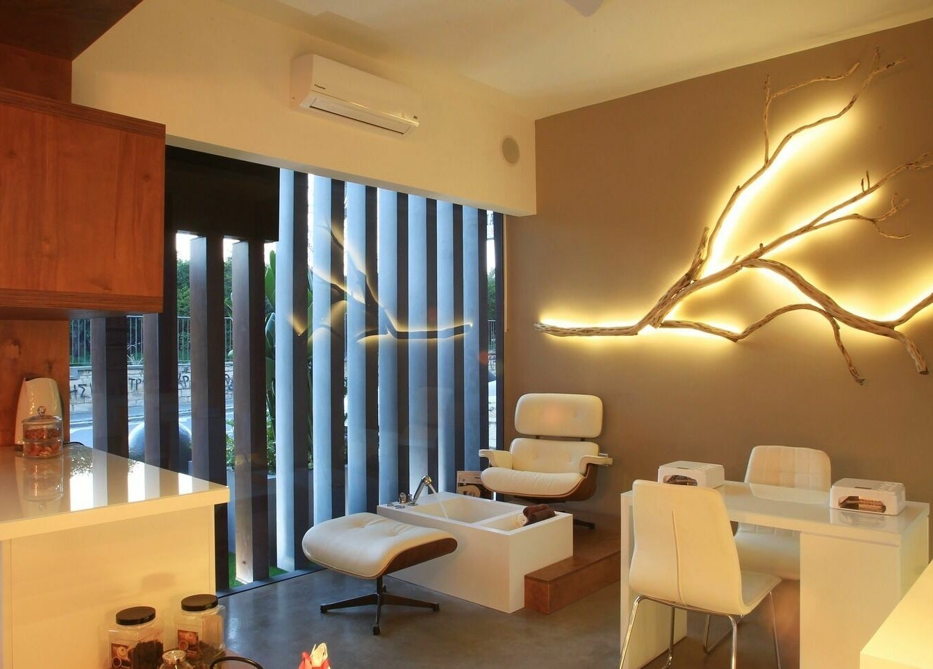 Relaxation area at Suenso Spa, Limassol, Limassol, CY, featuring elegant seating and ambient lighting.